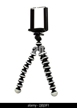 A tripod for a phone with a mount for a phone isolated on a white background Stock Photo