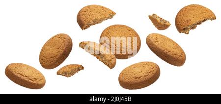Falling oatmeal cookies isolated on white background Stock Photo