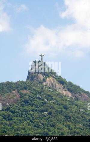 Christ the Redeemer in Rio de Janeiro, Brazil - February 25, 2022: Christ the Redeemer seen from Laranjeiras neighborhood in Rio de Janeiro. Stock Photo