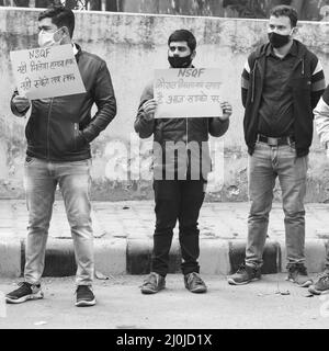 Delhi, India December 25 2021 : Delhi Contractual Guest Teachers with posters, flags and graffiti’s protesting against Delhi AAP Government for making