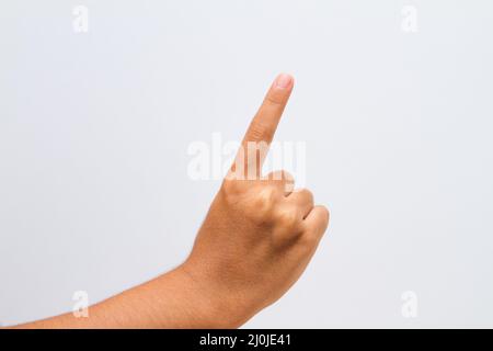 child making the sign up on a white background in Rio de Janeiro. Stock Photo