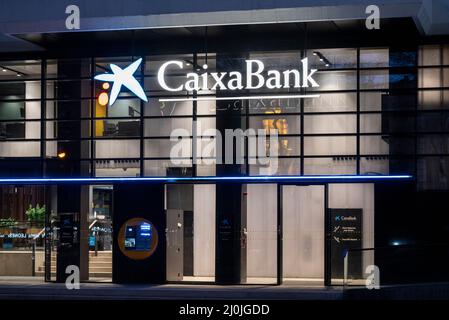 Madrid, Spain. 17th Mar, 2022. Spanish largest savings bank Caixa Bank (CaixaBank) branch in Spain. (Photo by Xavi Lopez/SOPA Images/Sipa USA) Credit: Sipa USA/Alamy Live News Stock Photo