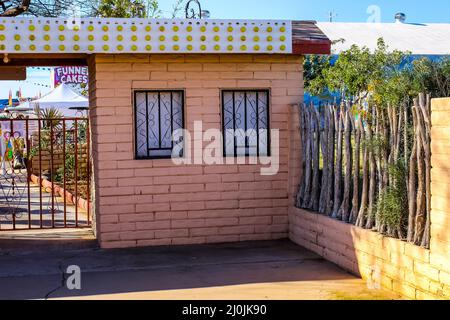 Small Ticket Booth Building With Admission Windows At Small County Fair Stock Photo