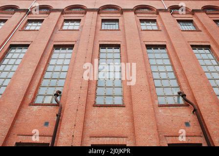Facade of an old factory building. Stock Photo