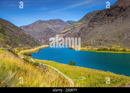 Emerald-colored quiet deep water Stock Photo