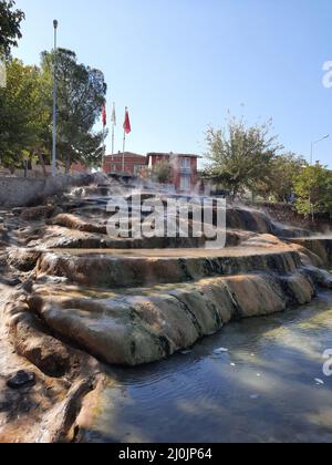The red springs of Karahayit are a separate spring water with a unique combination of minerals that has caused this water to flow out red, leaving beh Stock Photo