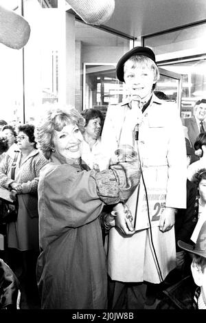 Impressionist Janet Brown was in North Shields on 1st September 1982 opening a brand new Co-op store and as part of the day there was a contest for budding mimics. Runner-up Paul Davidson is interviewed by Janet Stock Photo