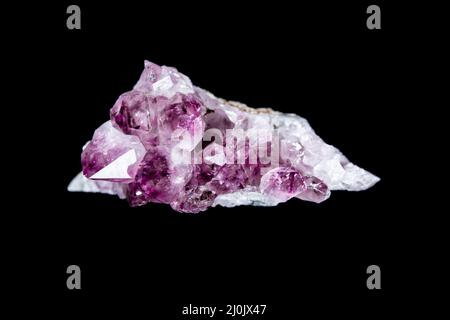 Amethyst gemstone on a black background Stock Photo