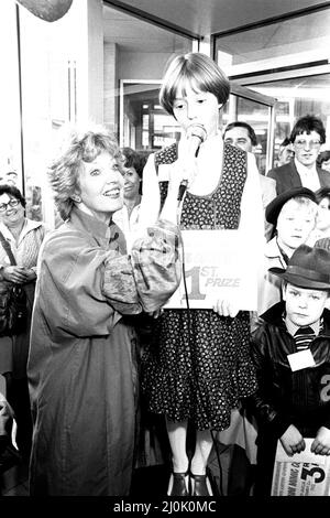 Impressionist Janet Brown was in North Shields on 1st September 1982 opening a brand new Co-op store and as part of the day there was a contest for budding mimics. Janet interviews the winner Janette Dargue Stock Photo