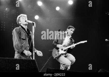 British rock group The Who in Toronto, Canada.Singer Roger Daltrey and guitarist Pete Townshend performing on stage at Maple Leaf Gardens, the last venue on their Farewell tour. December 1982. Stock Photo