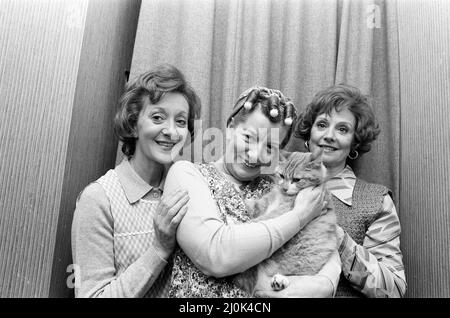 Coronation Street's Thelma Barlow (Mavis Riley), Jean Alexander (Hilda Ogden) and Barbara Knox (Rita Sullivan) with the Street's cat. November 1980. Stock Photo