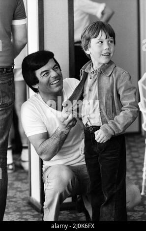 Disc Jockey Tony Blackburn and his son Simon, 8, at Thorpe Park, where he is taking part in a Radio 1 roadshow. 1st June 1981. Stock Photo