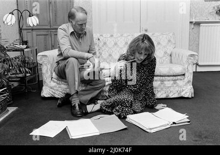 Happily married couple, Esther Rantzen and husband Desmond Wilcox pictured at their home in Kew, London. 11th November 1981. Stock Photo