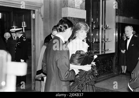 Lady Diana Spencer attended her first public engagement tonight, when she joined Prince Charles at a Gala Charity Concert at the Goldsmith's Hall, London, in aid of the Royal Opera House. Princess Grace of Monaco also attends the event, as seen in other frames in this set.  Note to Editors : Diana is wearing a black dress, as seen in the colour Mirrorpix pictures from this event.  Picture taken 9th March 1981 Stock Photo