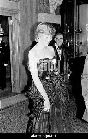 Lady Diana Spencer attended her first public engagement tonight, when she joined Prince Charles at a Gala Charity Concert at the Goldsmith's Hall, London, in aid of the Royal Opera House. Princess Grace of Monaco also attends the event, as seen in other frames in this set.  Note to Editors : Diana is wearing a black dress, as seen in the colour Mirrorpix pictures from this event.  Picture taken 9th March 1981 Stock Photo