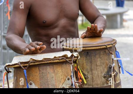 Musician playing atabaque which is a brazilian percussion instrument of African origin Stock Photo