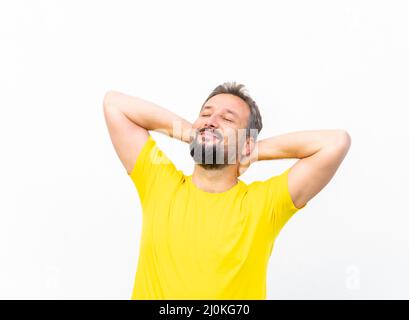 One positive man with yellow shirt portrait Stock Photo