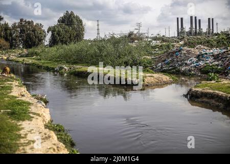 Gaza, Palestine. 19th Mar, 2022. General view of Wadi Gaza, a wetland area in the central Gaza Strip. In Wadi Gaza, plastic bottles and putrid water have taken the place of trees, flowers and animals. But aware of the health dangers, the local authorities are working to transform the marsh into the first natural park in the Palestinian enclave. Credit: SOPA Images Limited/Alamy Live News Stock Photo