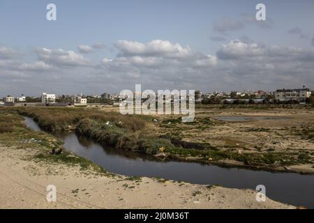 Gaza, Palestine. 19th Mar, 2022. General view of Wadi Gaza, a wetland area in the central Gaza Strip. In Wadi Gaza, plastic bottles and putrid water have taken the place of trees, flowers and animals. But aware of the health dangers, the local authorities are working to transform the marsh into the first natural park in the Palestinian enclave. (Photo by Mahmoud Issa/SOPA Images/Sipa USA) Credit: Sipa USA/Alamy Live News Stock Photo