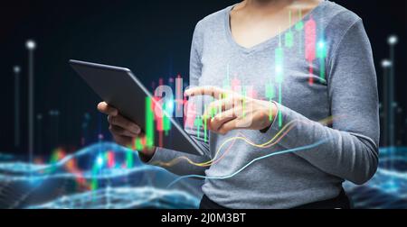 Stock analysis with growth graph and on digital tablet Stock Photo