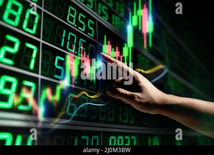 Stock analysis with growth graph and on digital tablet Stock Photo