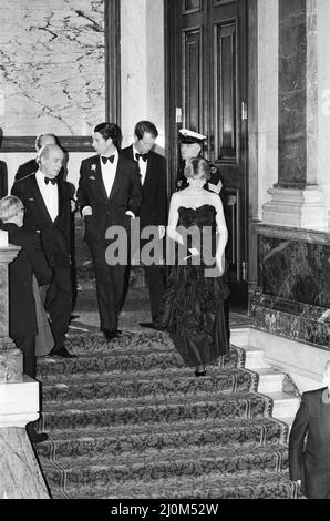 Lady Diana Spencer attended her first public engagement tonight, when she joined Prince Charles at a Gala Charity Concert at the Goldsmith's Hall, London, in aid of the Royal Opera House. Princess Grace of Monaco also attends the event, as seen in other frames in this set.  Note to Editors : Diana is wearing a black dress, as seen in the colour Mirrorpix pictures from this event.  Picture taken 9th March 1981 Stock Photo