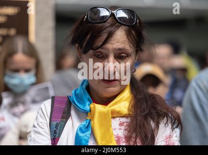 NEW YORK, N.Y. – March 19, 2022: A demonstrator is seen in United Nations Plaza during a protest against Russia’s invasion of Ukraine. Stock Photo