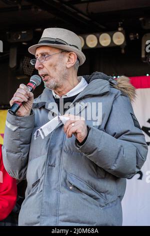 London, England, UK. 19th Mar, 2022. British author Michael Rosen during his speech in Parliament Square, after the March Against Racism ahead of the UN Antiracism Day 2022. In his moving speech he tanked NHS migrant workers for saving his life during the COVID-19 pandemic. (Credit Image: © Sabrina Merolla/ZUMA Press Wire) Stock Photo