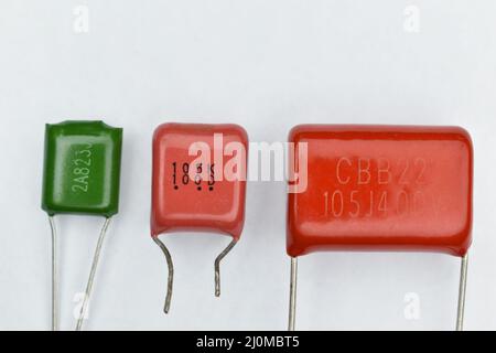 mylar capacitors on white background Stock Photo