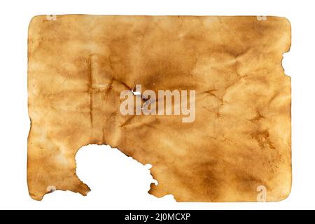 Burned old sheet of paper on a transparent background. Texture of old paper. Stock Photo