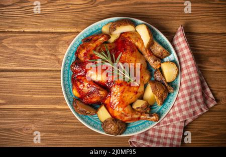 Whole roasted chicken from above Stock Photo