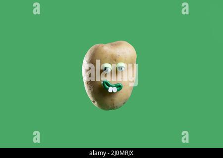 Funny potato with cute sticker Stock Photo