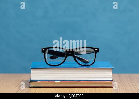 Front view books with glasses Stock Photo