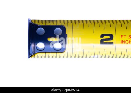 Close up to a Tape Measure, a tape measure or measuring tape is a flexible ruler used to measure size or distance. Stock Photo