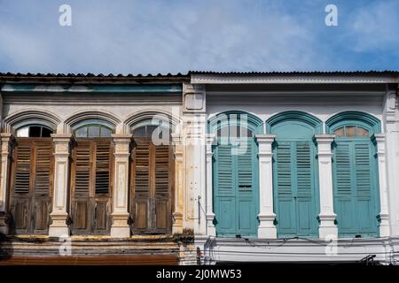 Phuket old town on a sunny morning with colorful buildings Street in the Portugese style Romani in Phuket Town. Also called Chin Stock Photo