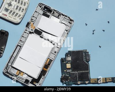 Flat lay disassembled phone Stock Photo