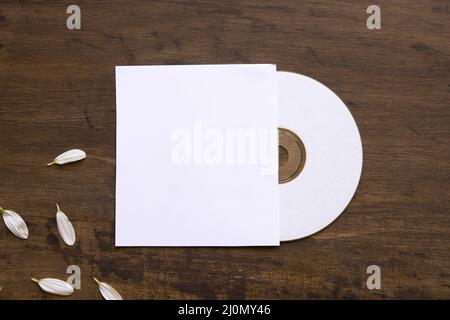 Cd mockup with petals cover Stock Photo