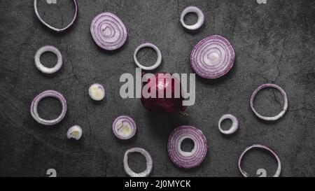 Flat lay arrangement red onion rings Stock Photo