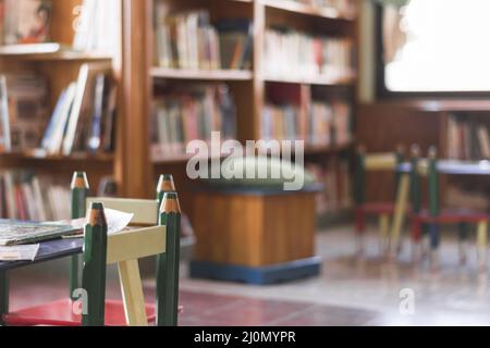 Chairs and table in kids library Stock Photo