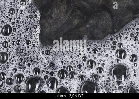 Bubbles dark water Stock Photo