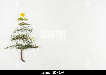 Border from decorative fir branches and red Christmas balls on a blue ...