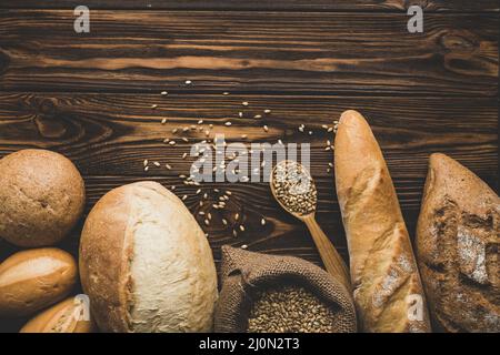 Assortment bread loaves wood Stock Photo