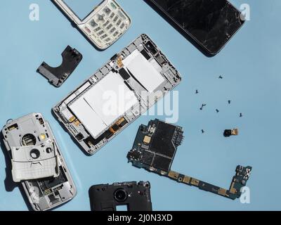 Flat lay disassembled phone parts Stock Photo