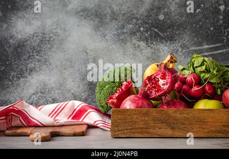 Kitchen table with fruit and vegetables Stock Photo