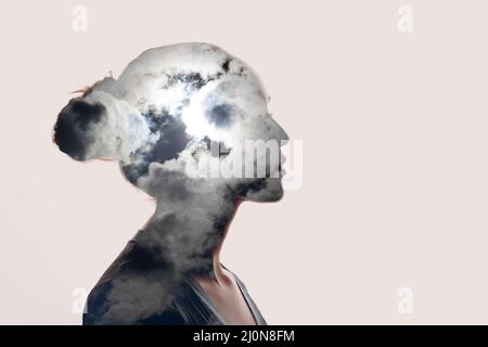 Psychology concept. Sunrise and woman silhouette head Stock Photo