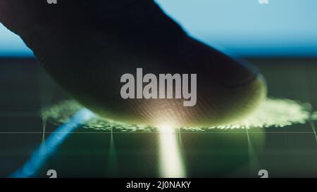 Close up of biometric scanner finger print  Stock Photo