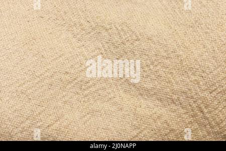 Linen fabric rough texture. Christmas canvas for textiles, clothing, interior, creativity in Scandinavia, Provence, rustic style Stock Photo