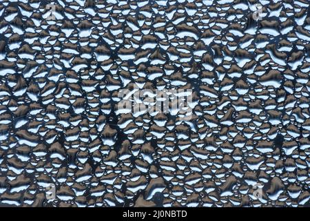 Macro close up of water droplets created by evaporation Stock Photo