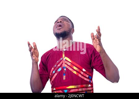 handsome surprised young man looking up with wide open mouth. Stock Photo
