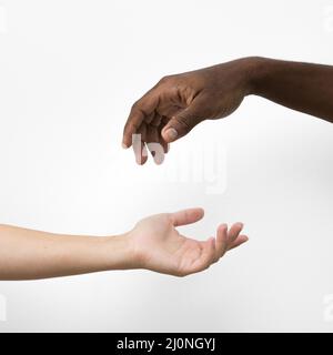 Multiracial hands coming together. High quality and resolution beautiful photo concept Stock Photo